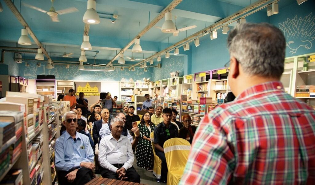 Wing Commander Bharat Bhushan Soni, Vir Chakra: A Life Shaped by Skill, Discipline, and Service audience listening to a man