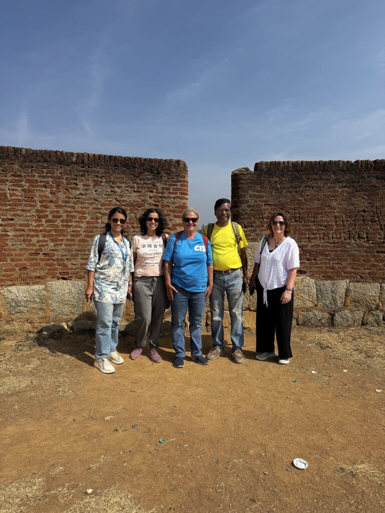 group standing on a fort