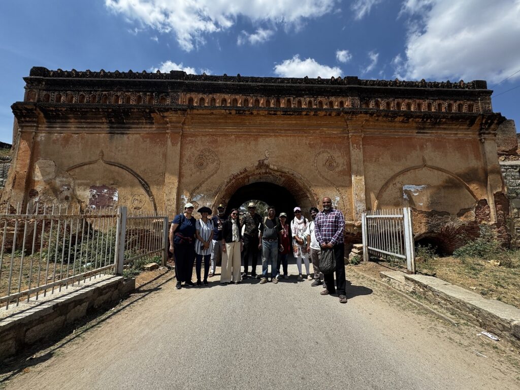 group standing in front of a fort